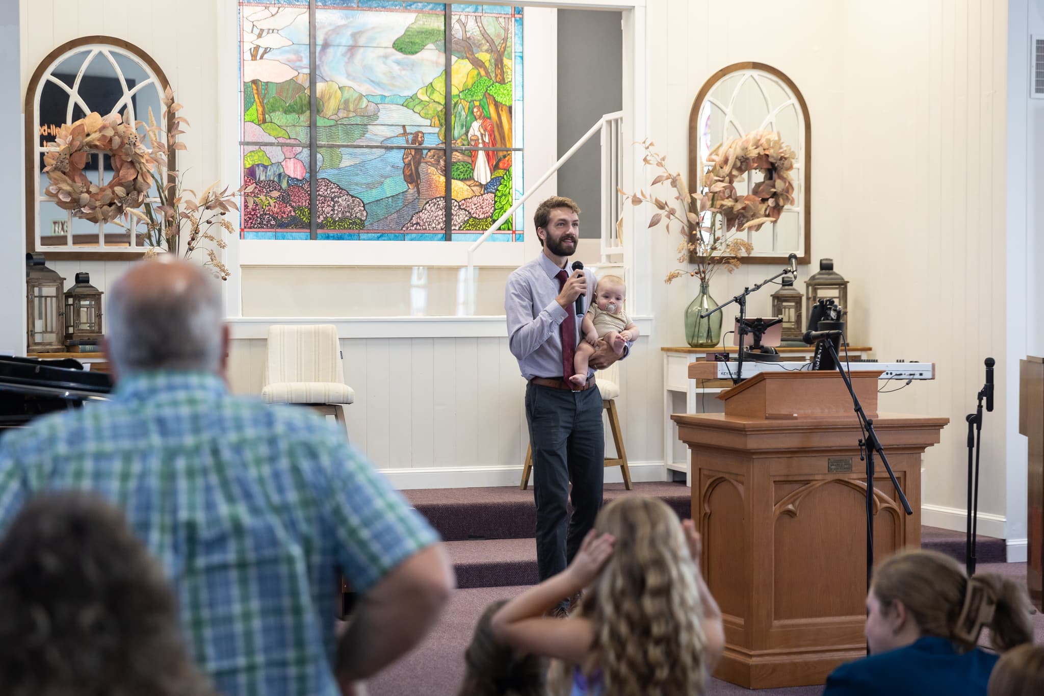 Worship leader playing guitar during service